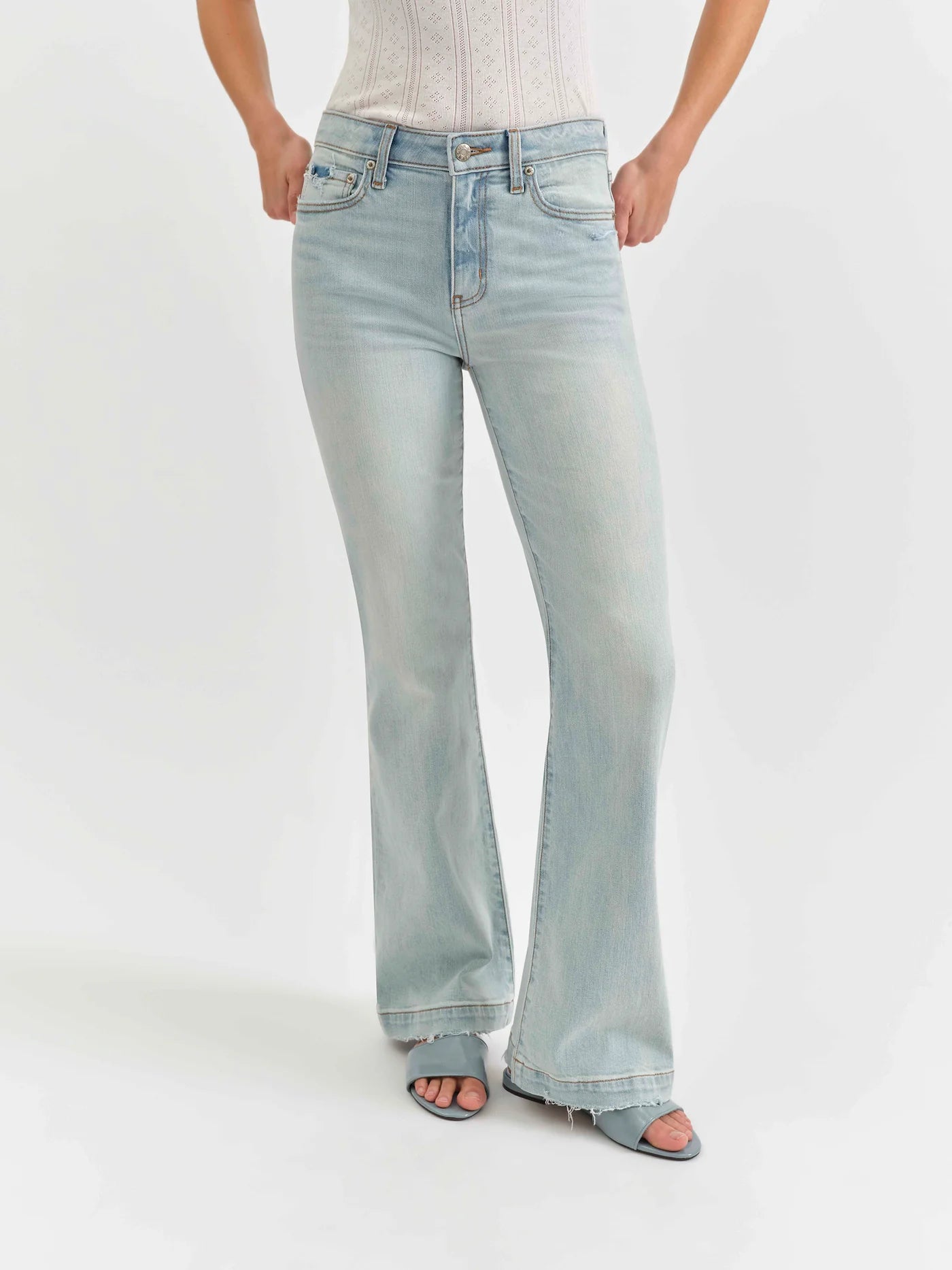 Mid-rise flare jeans by Daze Denim in swoon vintage wash.