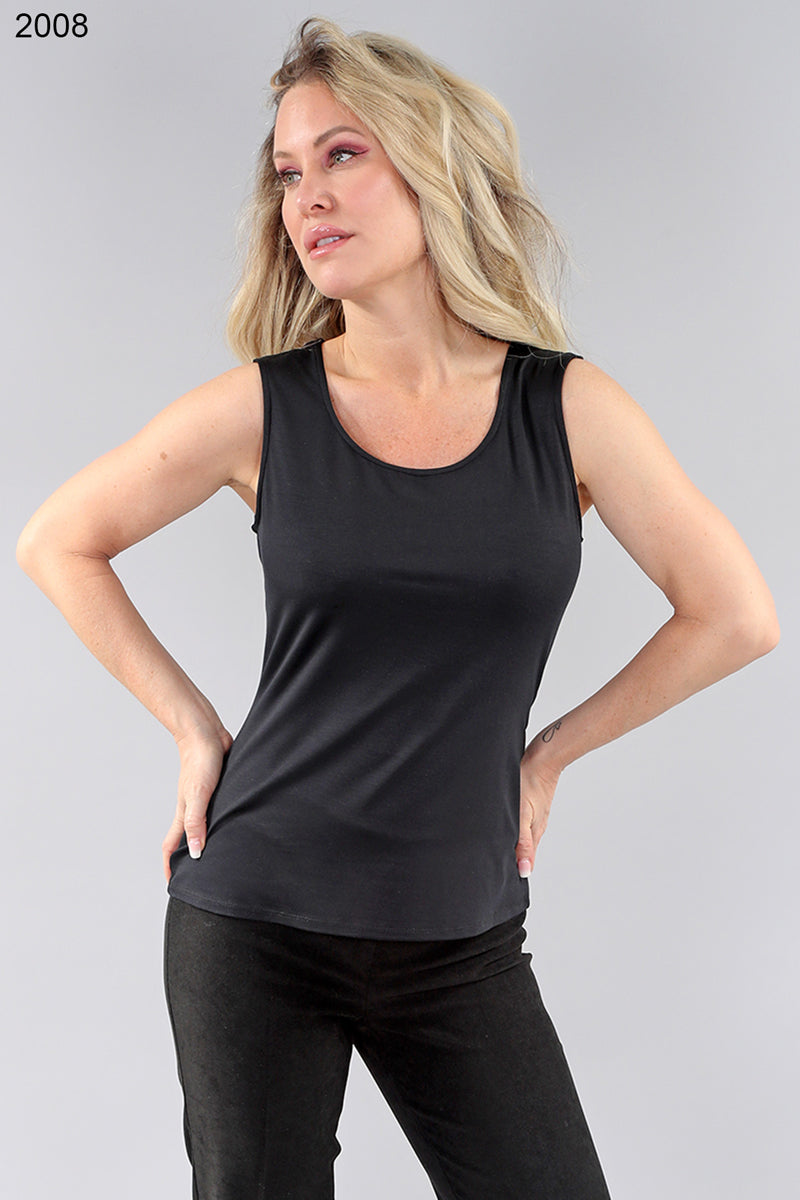 Model wearing black camisole tank by Michael Tyler.
