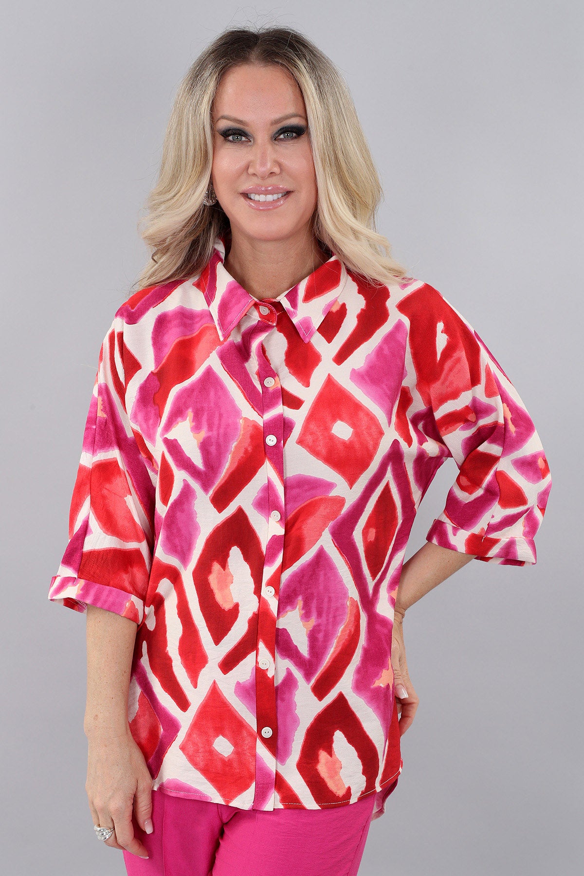 Michael Tyler Fuchsia Print 3/4 Sleeve Button-Up Shirt featuring roll-tab sleeves, lightweight breathable fabric, and a relaxed fit.