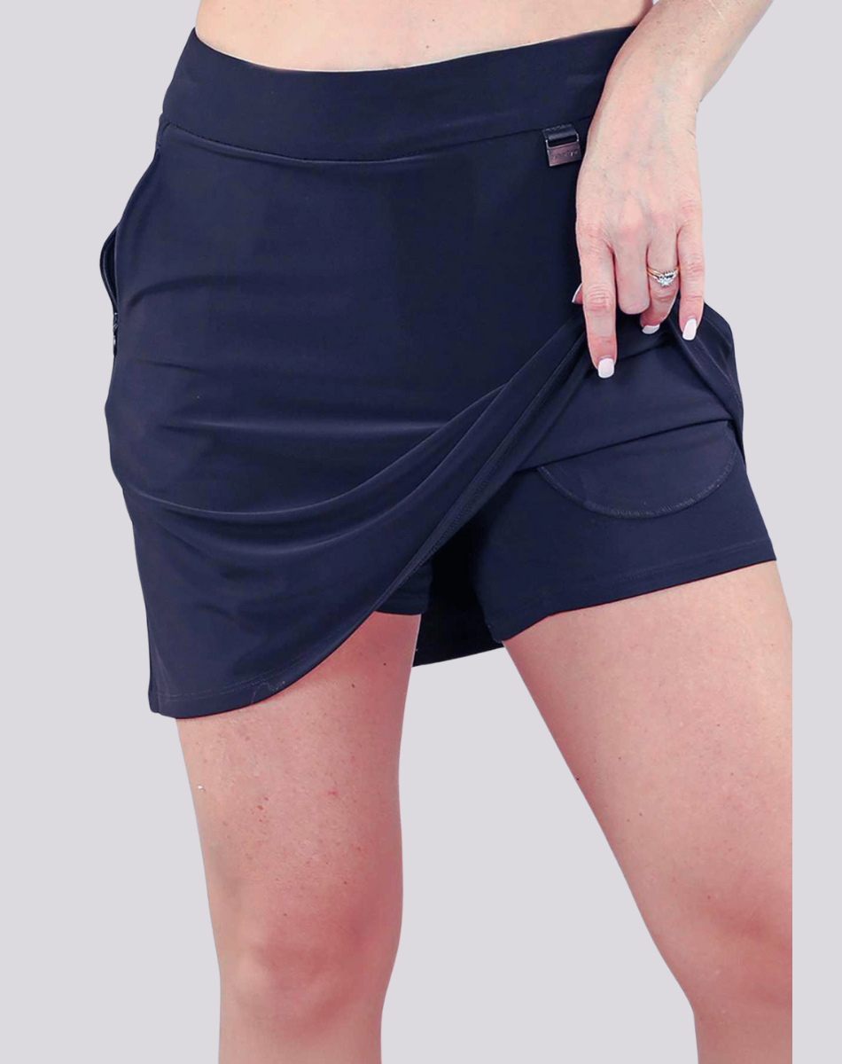 Michael Tyler Skort with Zip Pocket in navy, featuring a built-in short liner, stretchy waistband, and soft bamboo fabric.