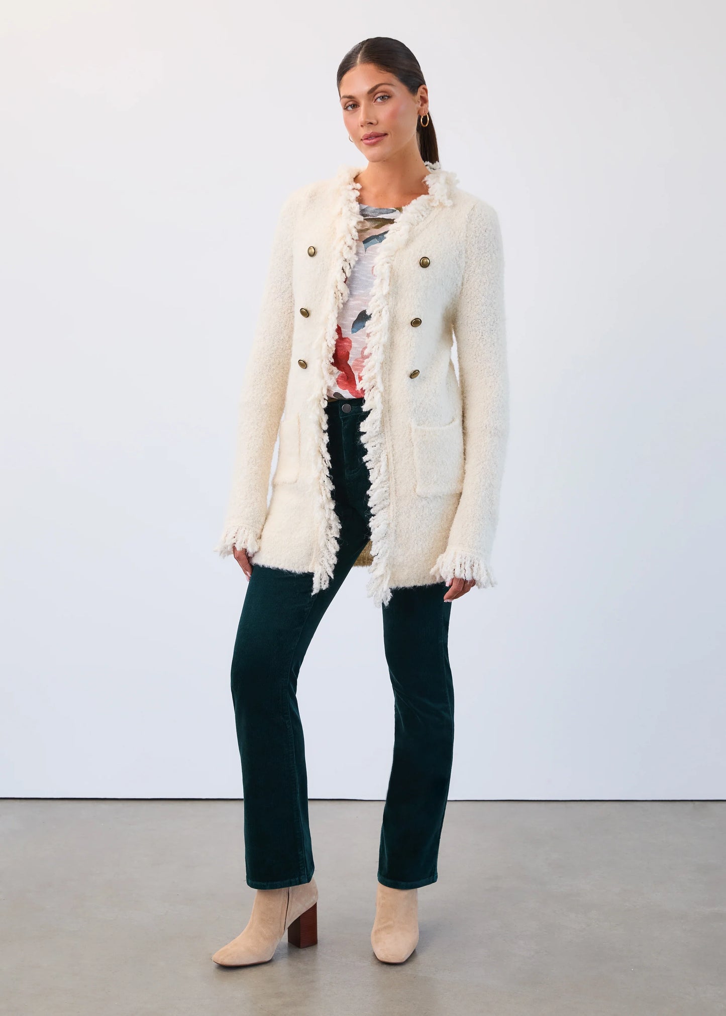 Woman wearing FDJ spruce Olivia bootcut corduroy pants, boutique style.