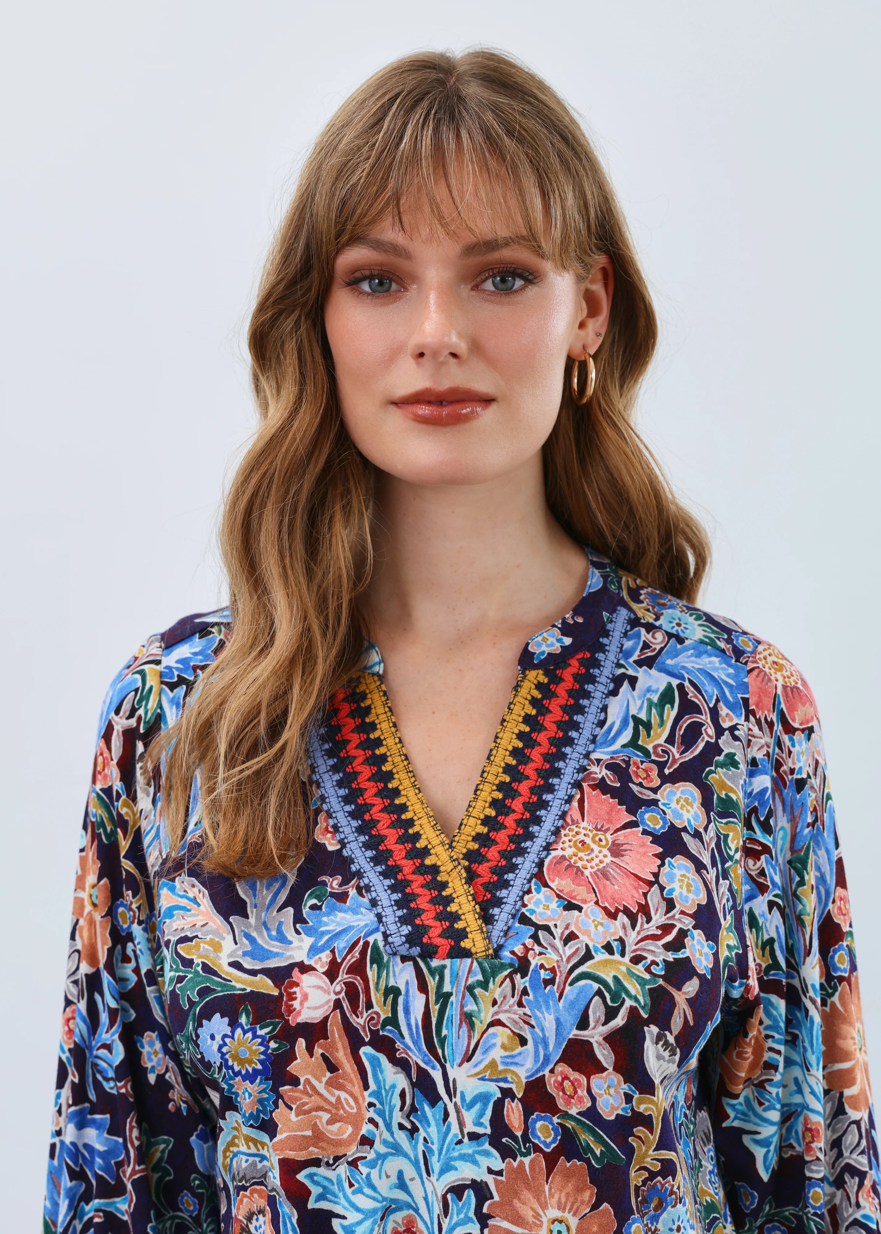 Woman wearing FDJ floral blouse in Damask Watercolour print, boutique style Canada.