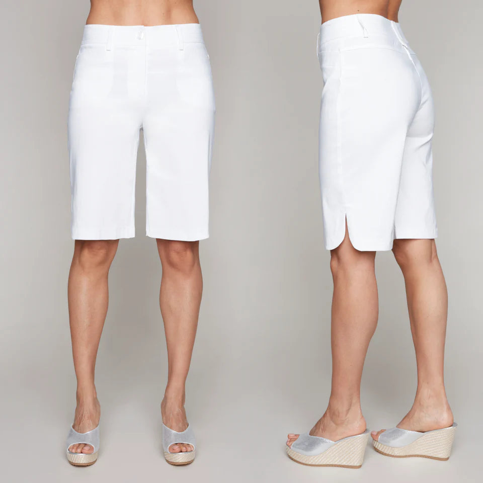 Woman wearing white Bermuda shorts with clean front, subtle slit at the hem, and tailored fit. Styled with wedge sandals, front and side views shown.