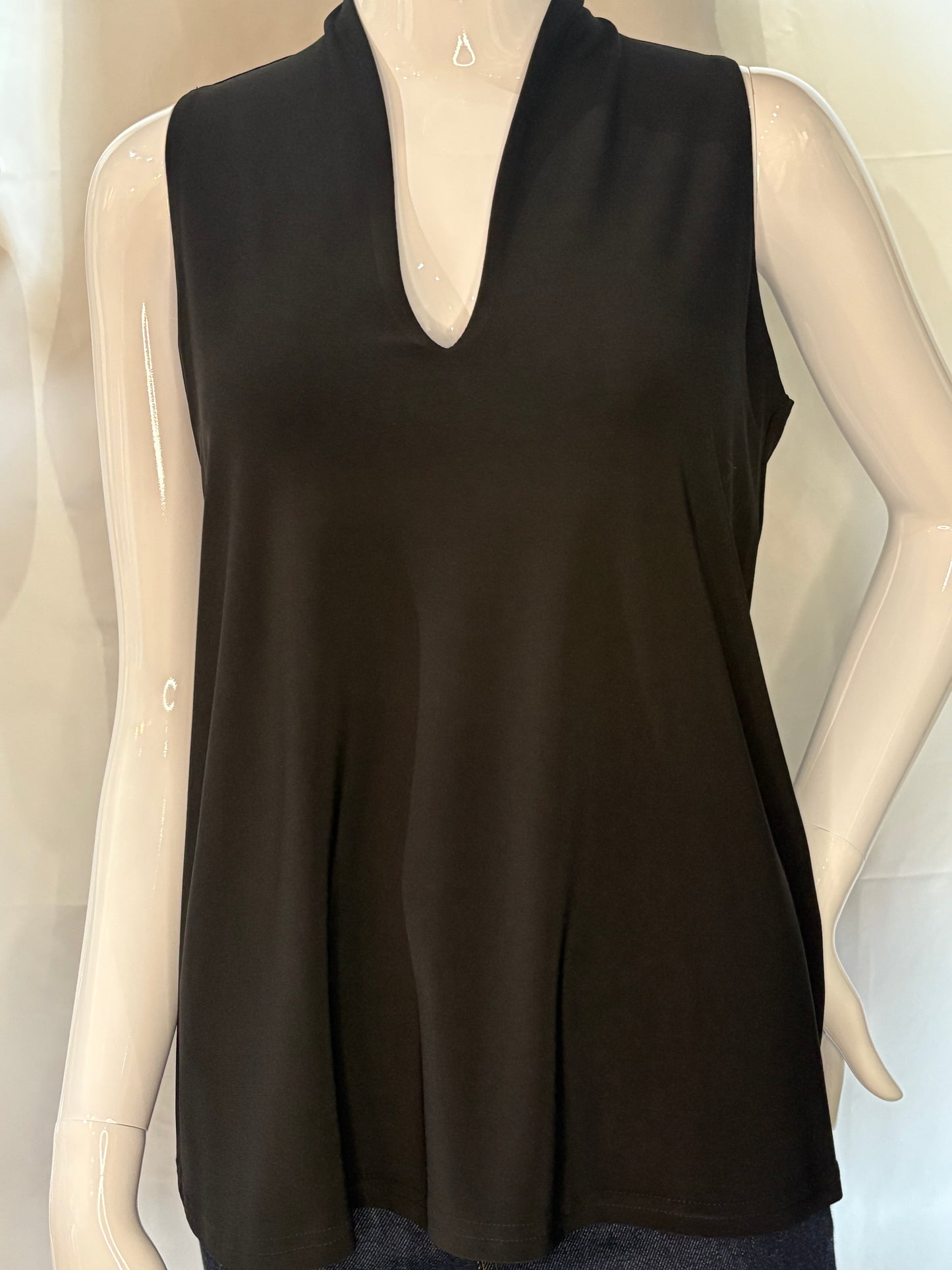 Close up view of the v-neck sleeveless tank top by Michael Tyler.