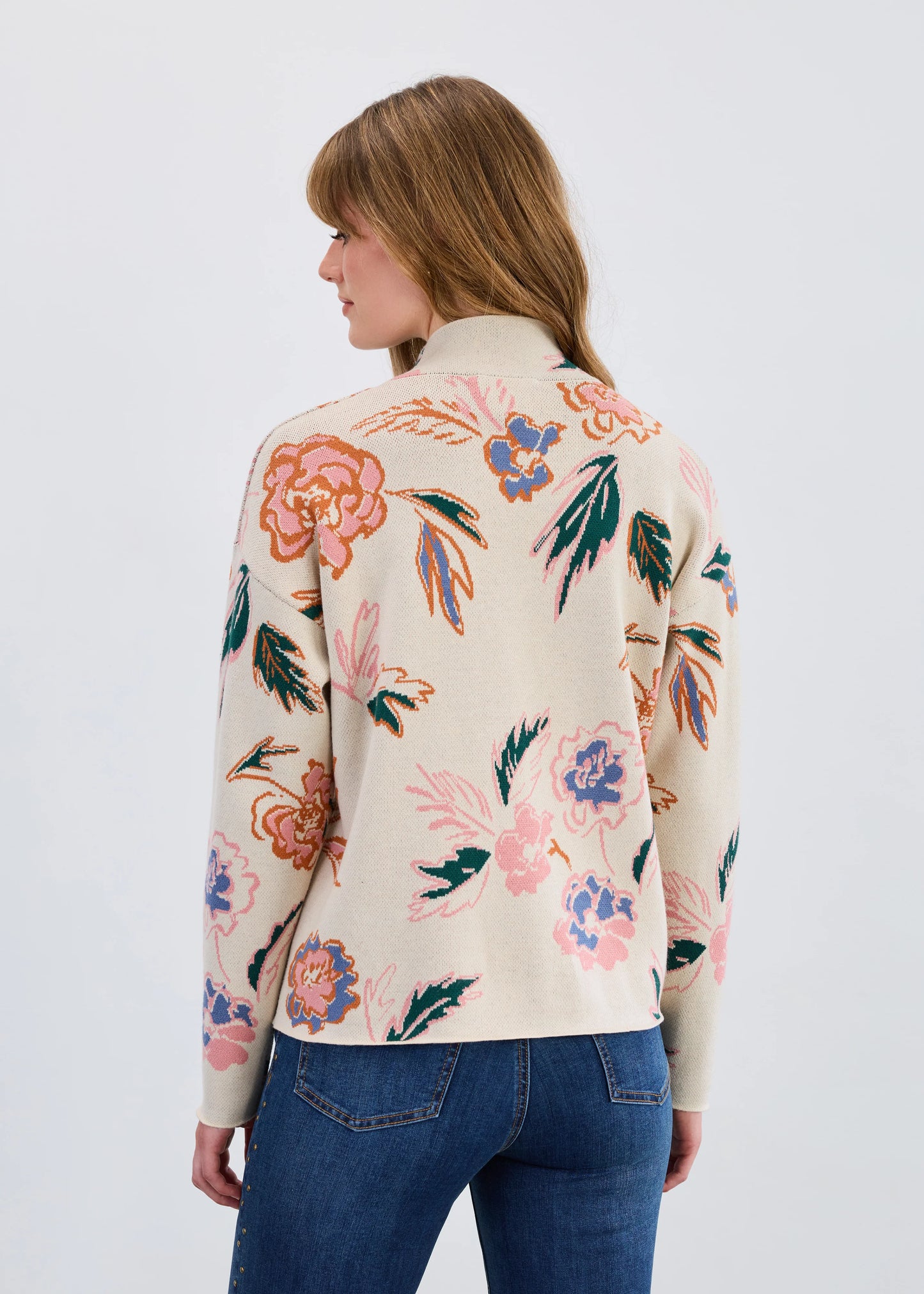 Side and back view of FDJ Bloomsbury floral mock neck sweater in oatmeal beige, showing relaxed fit and floral pattern. Shop Canadian boutique Gayle’s Fashions.