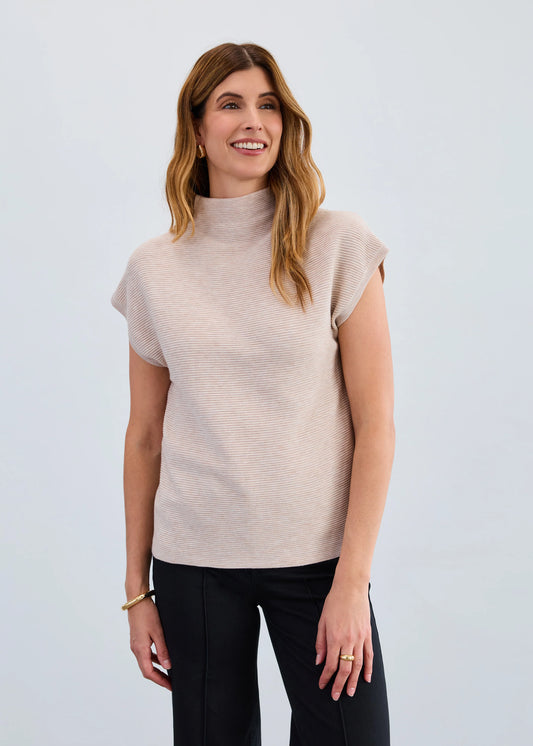Model wearing FDJ Ottoman Sweater Vest in oat, mock neck sleeveless knit top, Gayle’s Fashions Canada.
