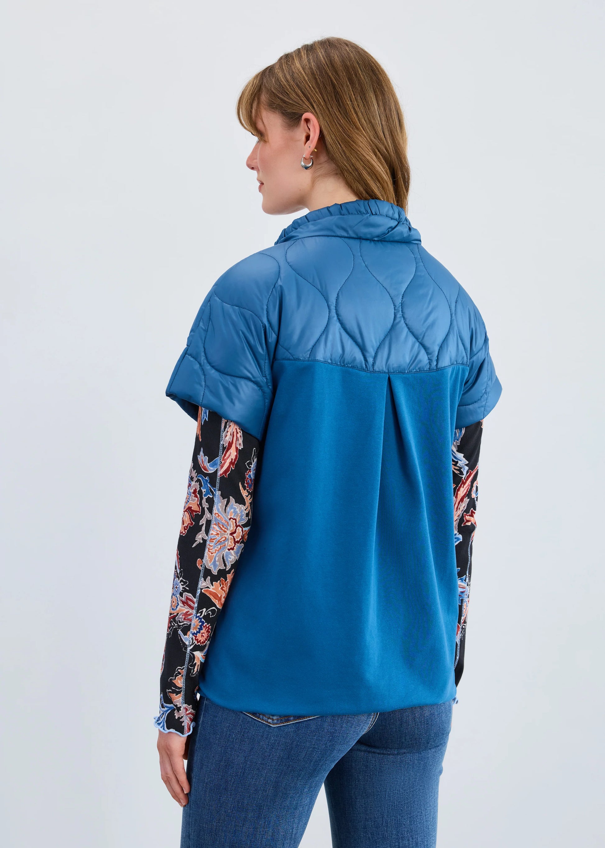 Back view FDJ short sleeve puff bomber jacket in indigo, women’s outerwear.