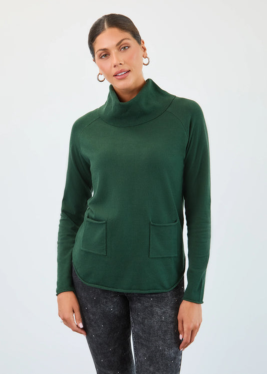 Woman modeling FDJ forest green cowl neck sweater, boutique fashion Canada.