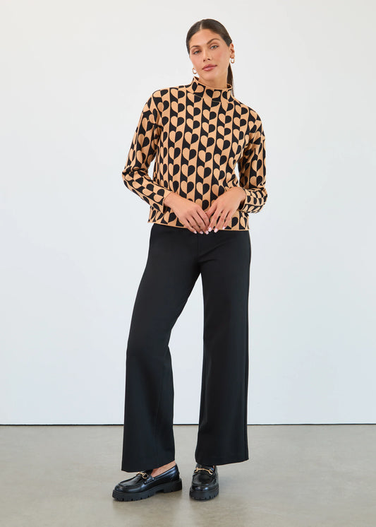 Model wearing FDJ pull-on wide leg pants in classic black, front view. Available at Gayle’s Fashions boutique in Canada.