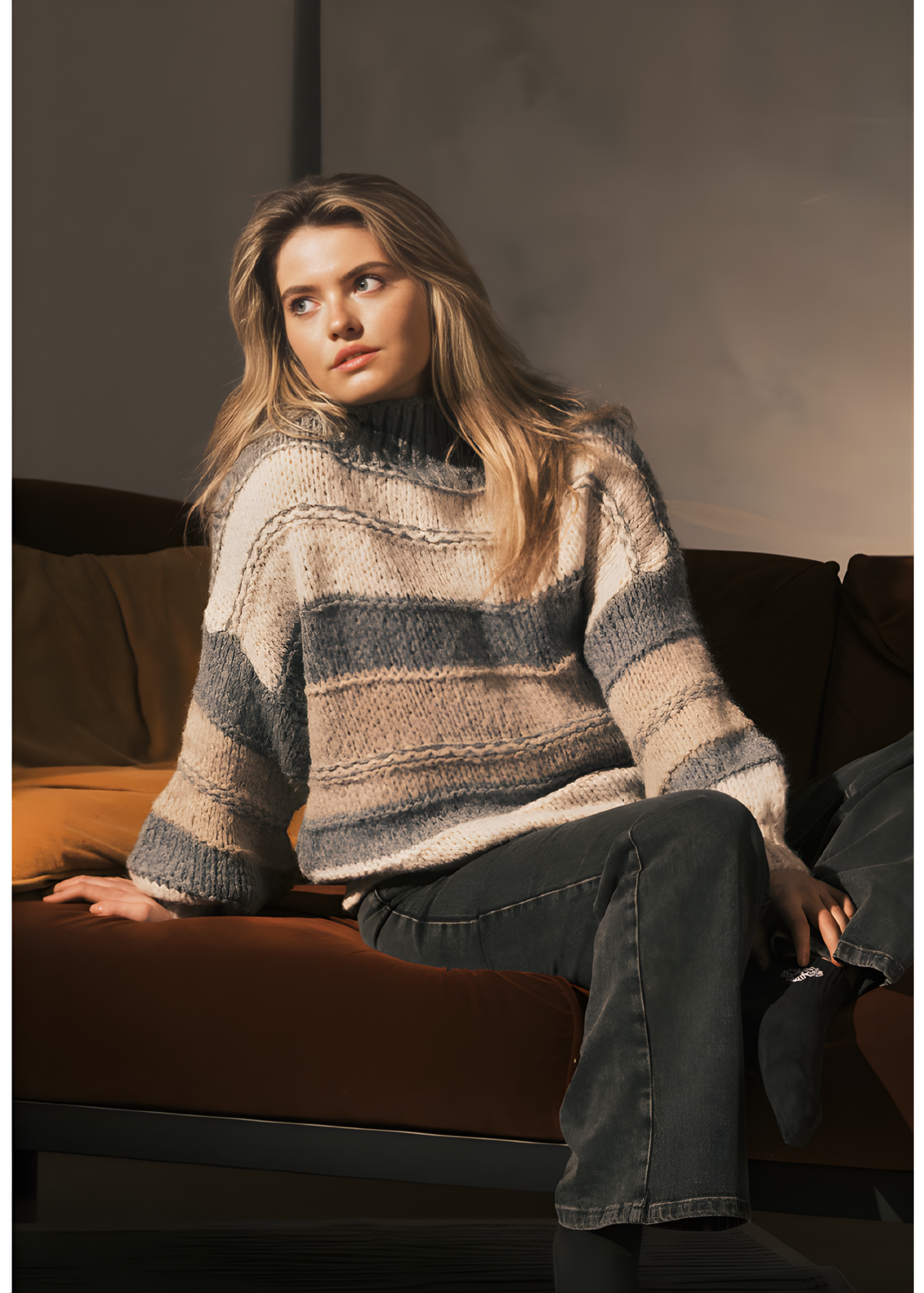 Taupe mock-neck balloon sleeve sweater from Jessica Laura’s cozy knit collection.