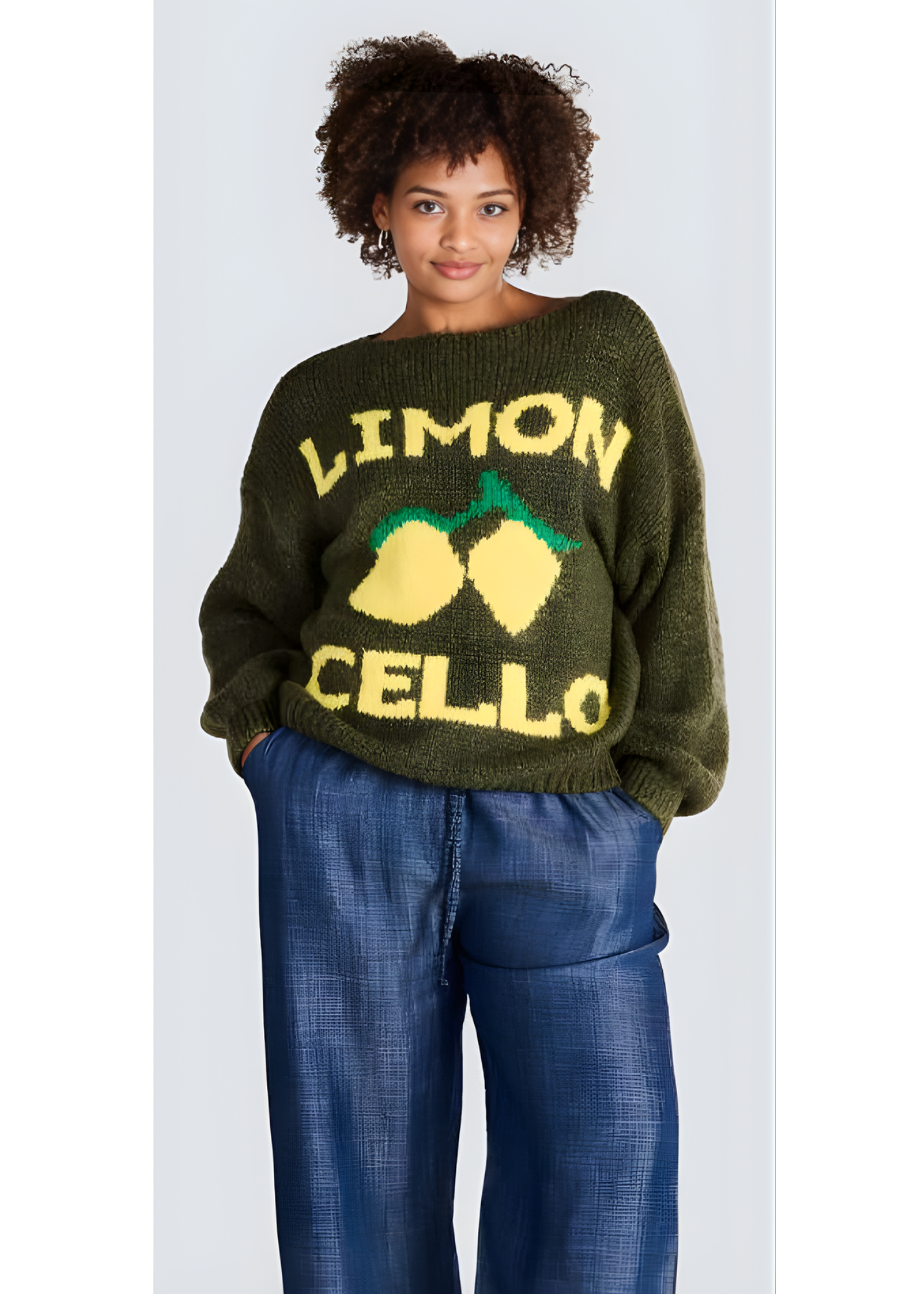 Jessica Laura oversized olive sweater with lemon motif across the chest.