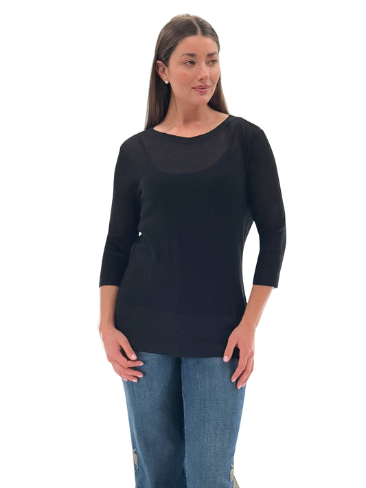 A model wearing Orly's black knit tank and sweater set, paired with blue jeans. A sheer knit, lightweight fabrication with 3/4 sleeves. Available at Gayle's Fashions, Port Alberni!