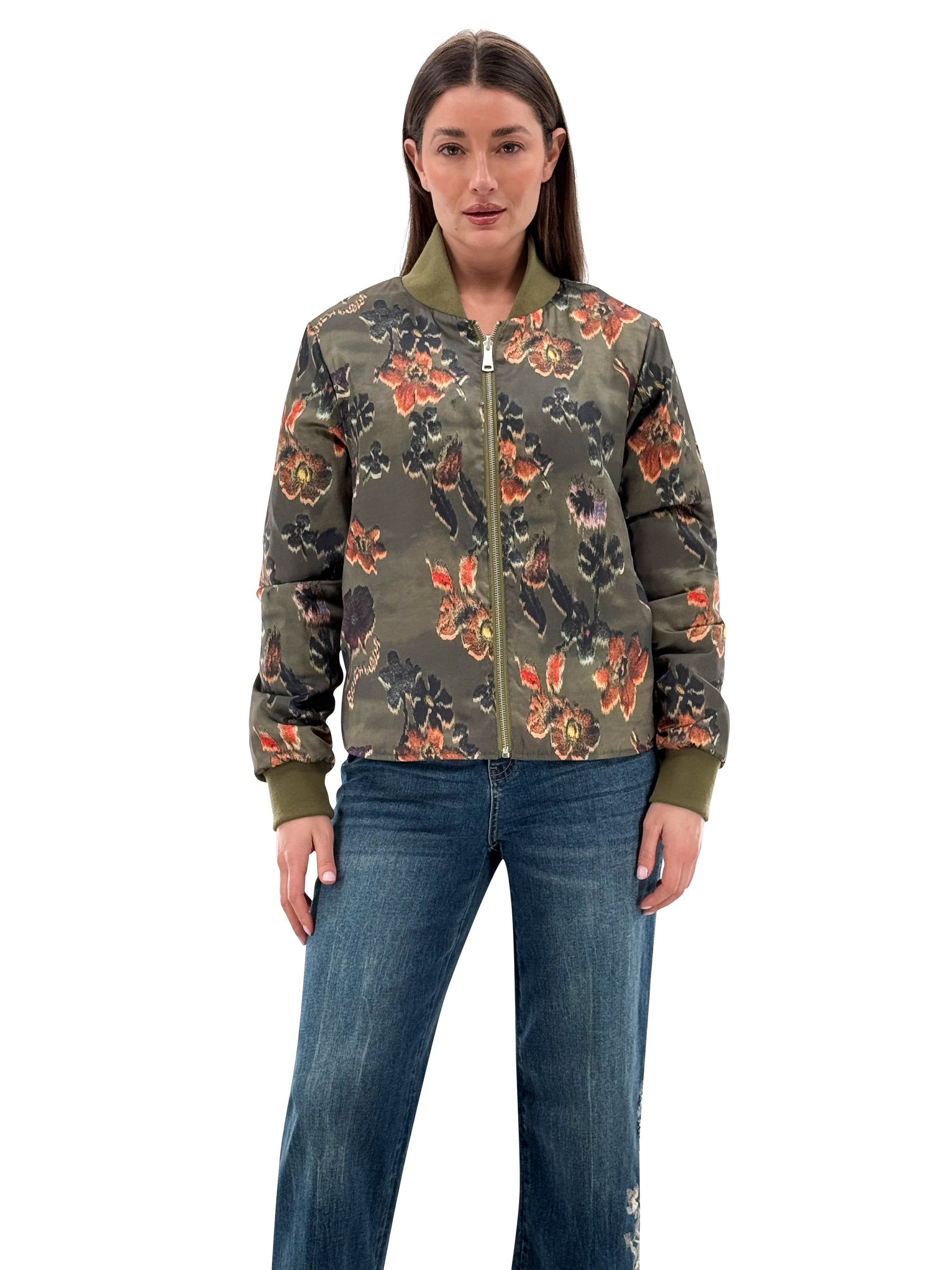 Model wearing Orly reversible zip-up insulated jacket in olive floral print, front view. Available at Gayle’s Fashions boutique in Canada.