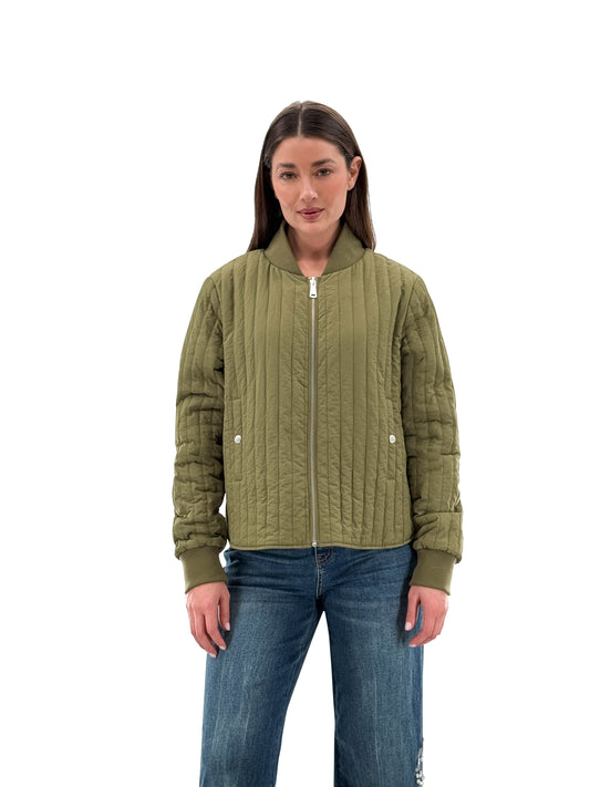 Model wearing Orly reversible zip-up insulated jacket in olive, front view. Available at Gayle’s Fashions boutique in Canada.