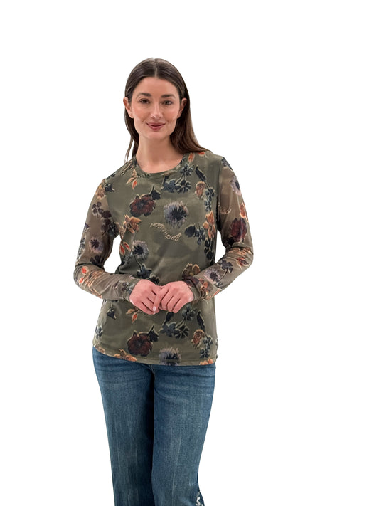 Model wearing Orly olive print crew neck top with long sleeves, front view. Available at Gayle’s Fashions boutique in Canada.
