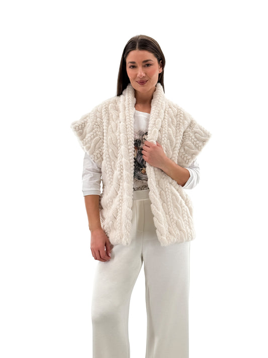 Model wearing Orly cream faux fur short sleeve shacket, front view. Available at Gayle’s Fashions boutique in Canada.