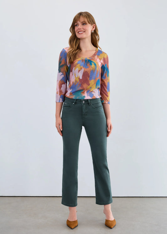 Woman modeling FDJ Olivia boot ankle jeans, spruce colour denim Canada.
