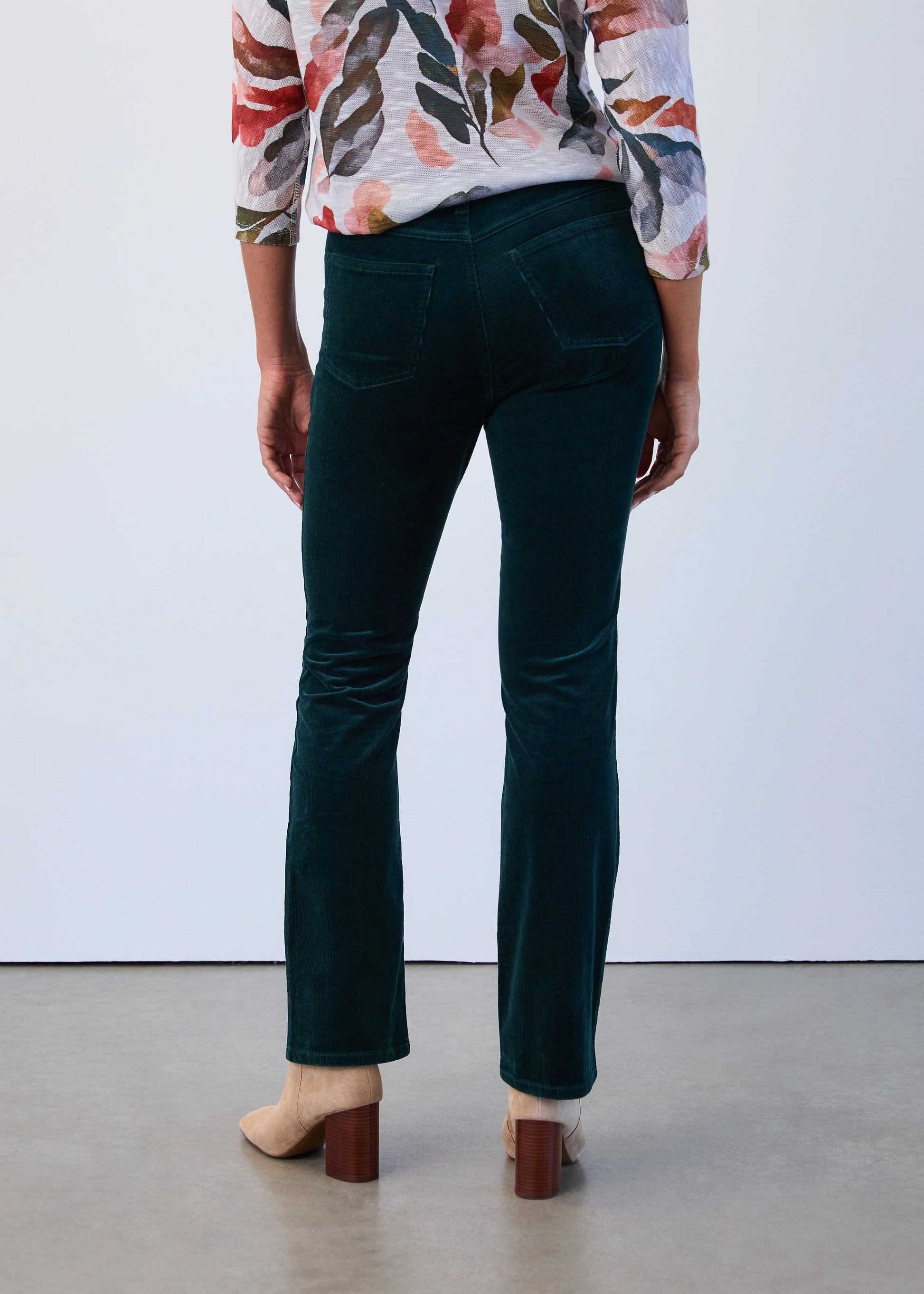 Back view Olivia bootcut pants in spruce green corduroy, Canadian fashion.