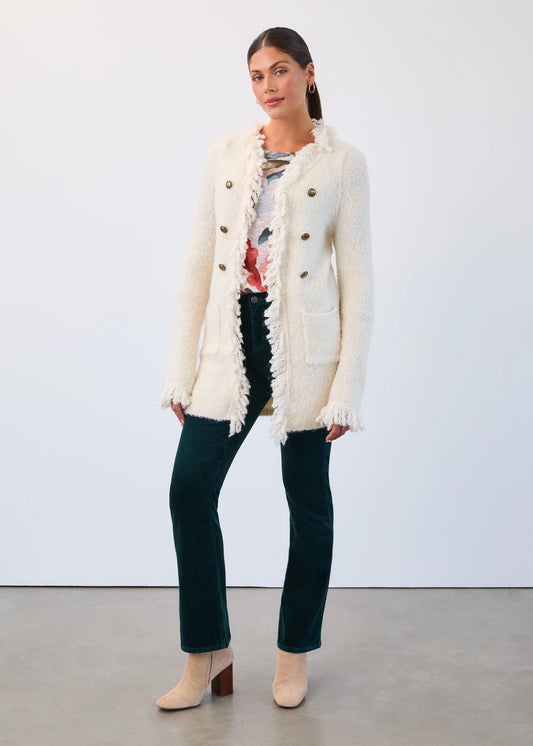 Woman wearing FDJ spruce Olivia bootcut corduroy pants, boutique style.