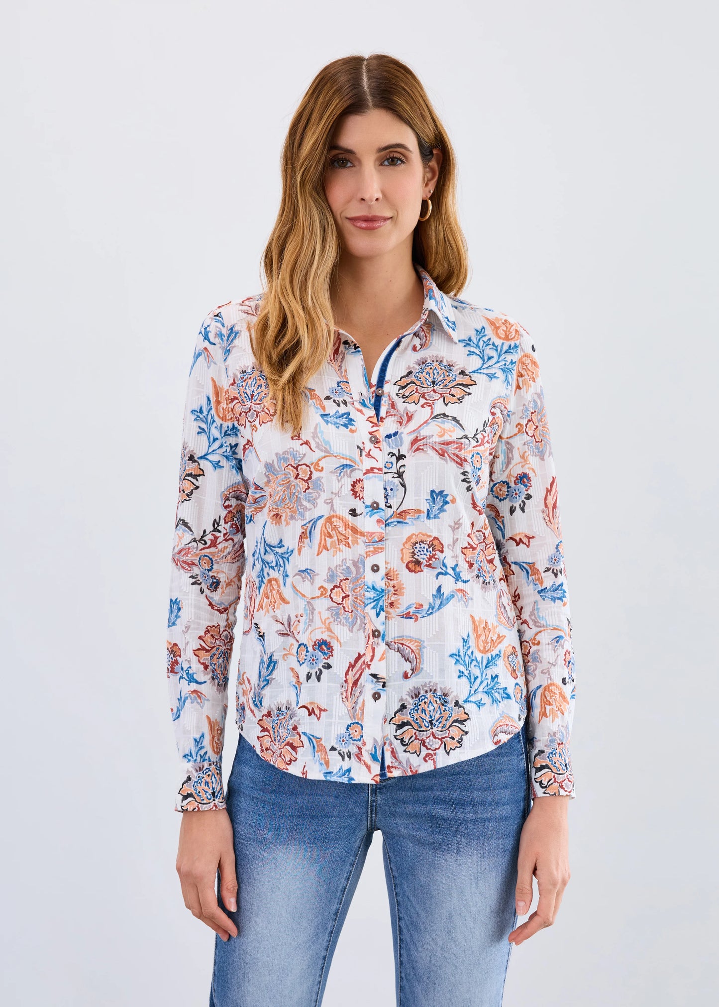 Woman wearing FDJ ivory neutral damask blouse with jeans, boutique style. Available at Gayle's Fashions, BC, Canada.