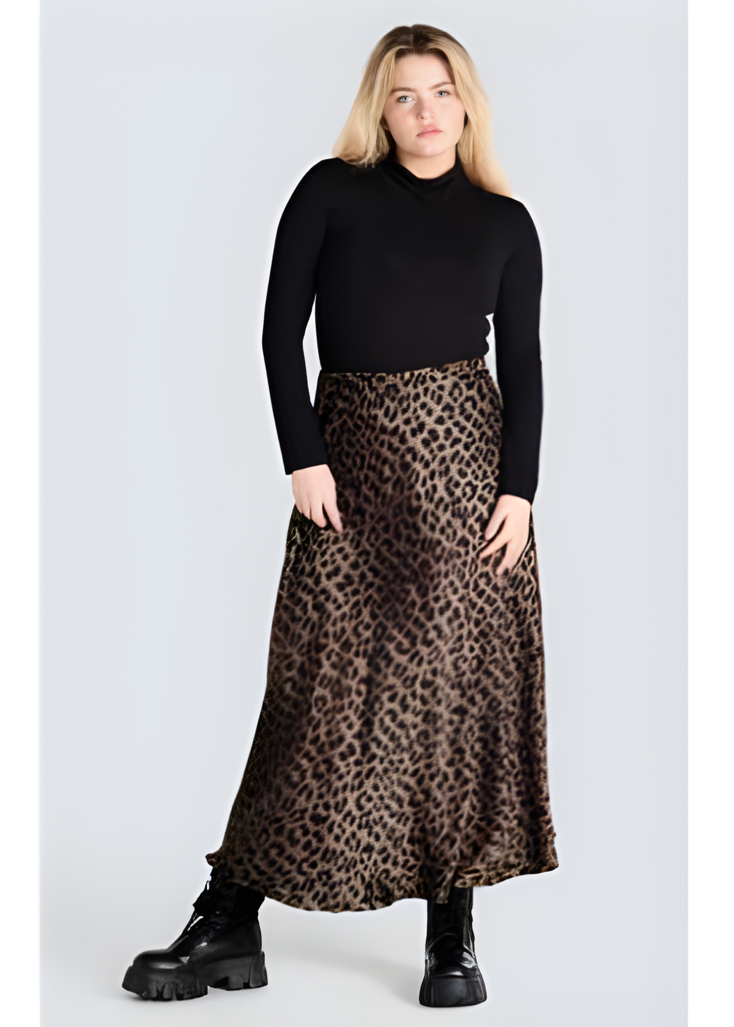 Jessica Laura animal-print bias skirt in silky brown and black tones, styled with a fitted black top.