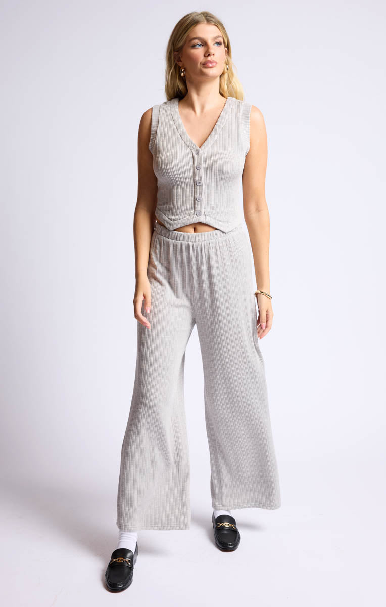 Model wearing rib knit wide leg pants in heather grey