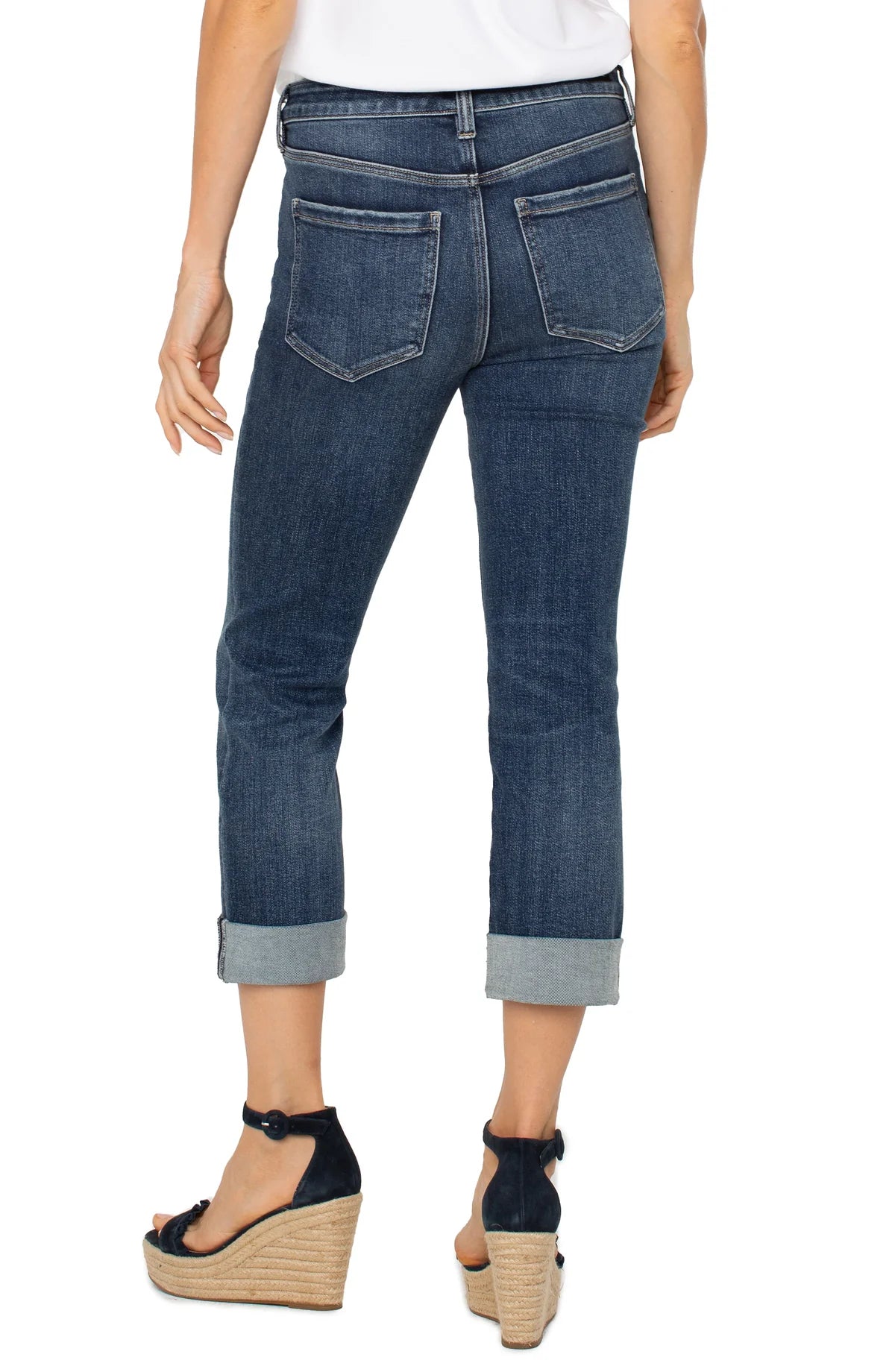 Back view of the Liverpool Charlie Crop Skinny Jean in Wells, highlighting the rear pockets, fitted silhouette, and cropped length with rolled cuffs.