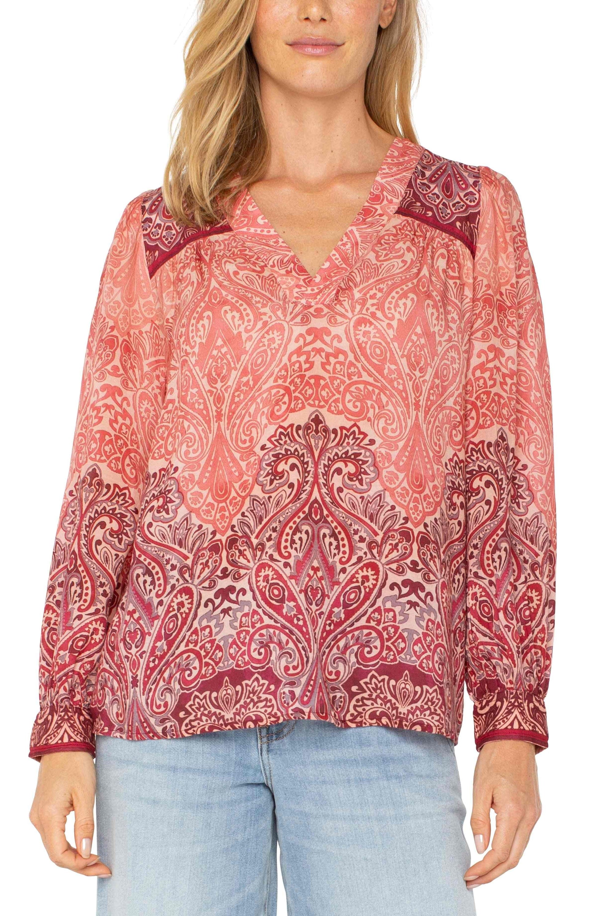 Full-length front view of the Liverpool LS V-Neck Popover Woven Blouse in Mauve Ombre Paisley, styled with light-wash denim for a relaxed, chic look.