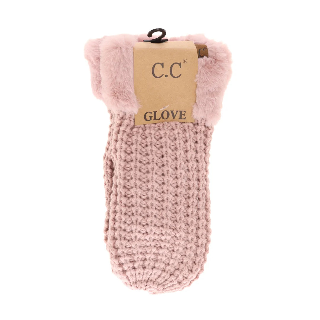 C.C Waffle Knit Mittens in dusty pink with faux fur cuffs, displayed hanging with the product tag visible.