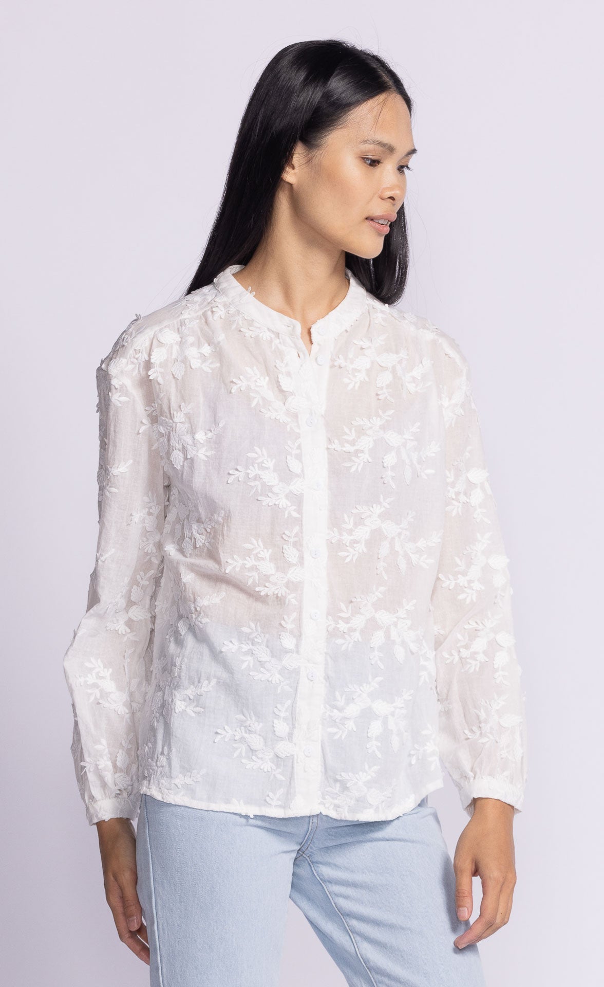 Front view of the Soya Concept Olivia Top in white, featuring intricate lace detailing and a classic button-down design.