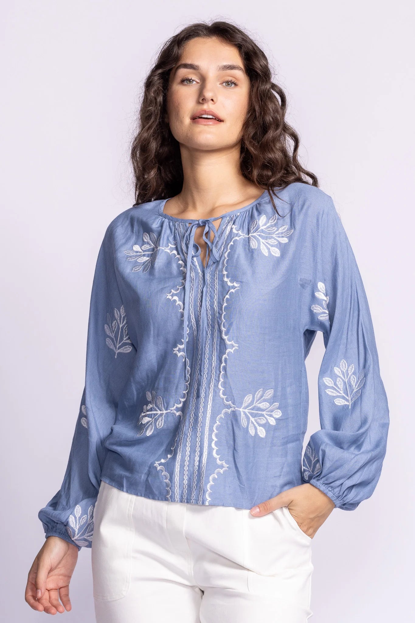 Close-up of the Soya Concept Whitney Top in blue, highlighting the embroidered details, tie neckline, and delicate boho-inspired design.