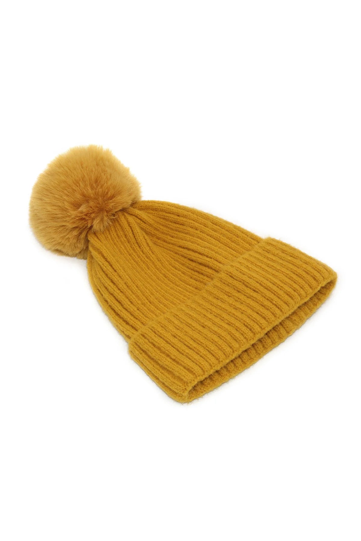 Side angle of the golden yellow Morgan Taylor Lula Beanie, showing its ribbed texture and fluffy pom-pom on a white background.