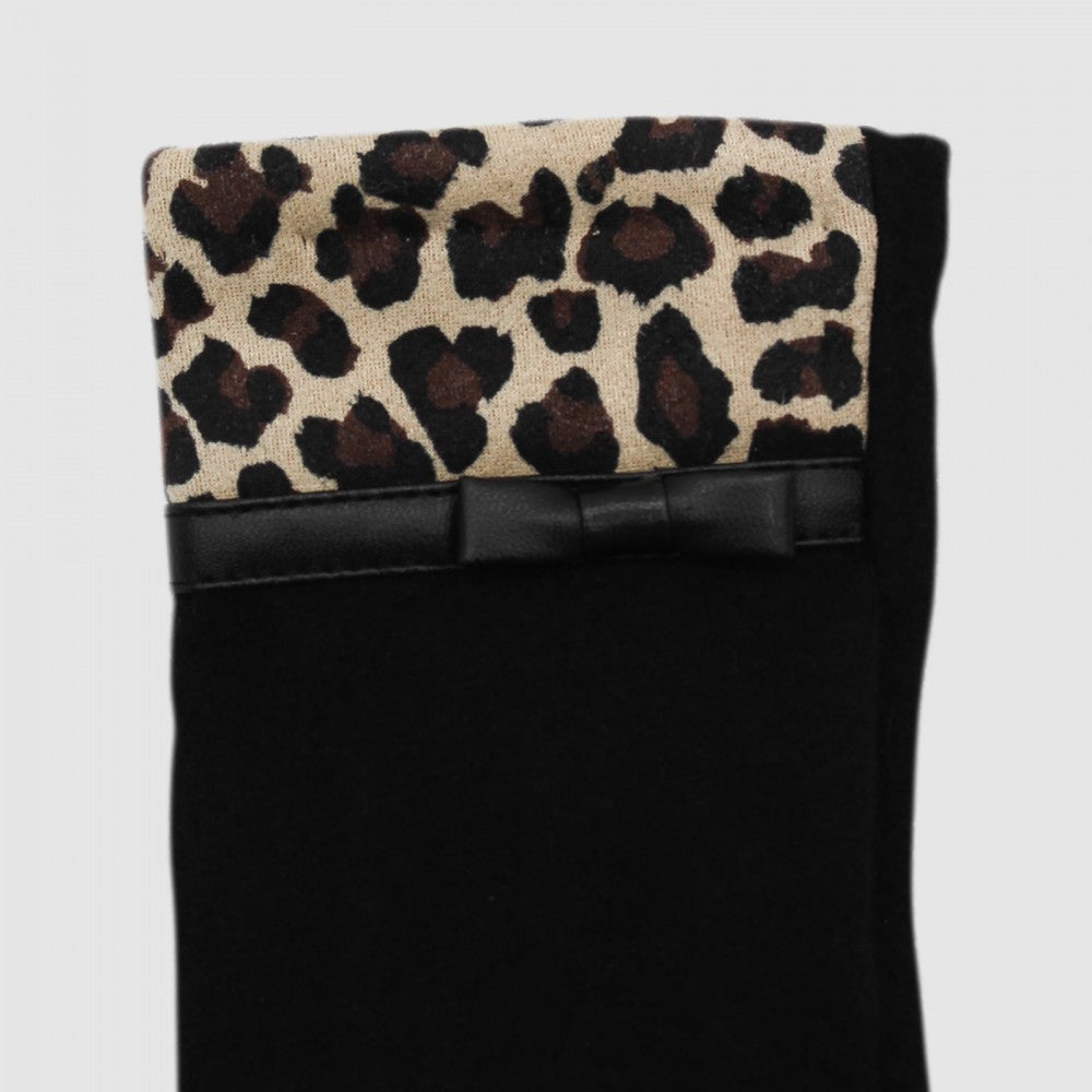 Close-up of Morgan & Taylor Jacqueline Woollen Gloves featuring a bold leopard print cuff and a sleek black bow detail.